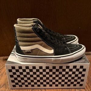 Vans Black and White High-Top Sneakers